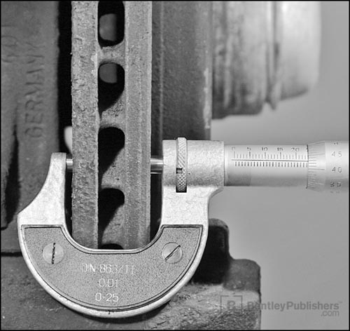 Measuring brake rotor wear.
Excerpted illustration from Merecedes-Benz C-Class Service Manual: 1994-2000 Section 00.04 Maintenance BentleyPublishers.com watermark not printed on actual product.)